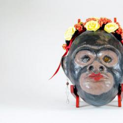 Monkey mask with flowers and earrings