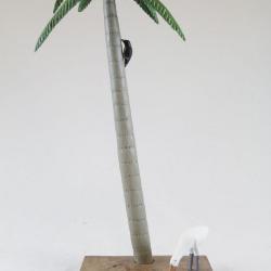 Palm Tree with Feeding Bird