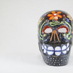 Large black skull mask with flowers